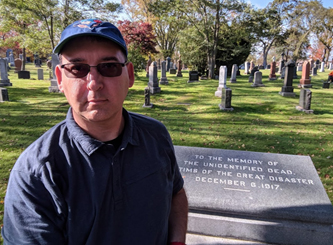 York U disaster and emergency management Associate Professor Jack Rozdilsky at Halifax St. Johns Cemetery, which hold the remains from some of the approximately 2,000 persons killed in the December 6, 1917 Halifax Harbour explosion 