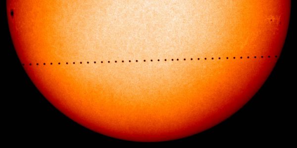 Mercury transits the Sun as seen from Earth in 2006. Credit ESA NASA SOHO