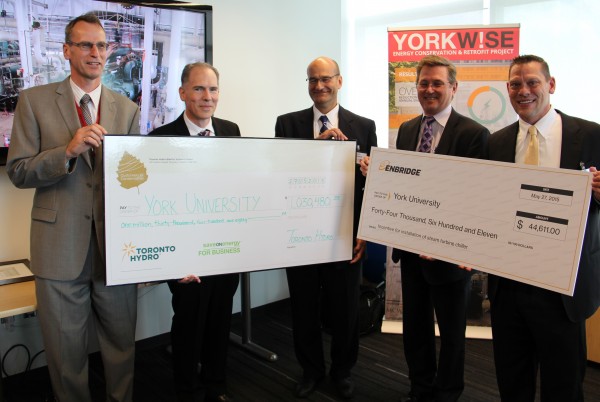  Michael Marchant, Toronto Hydro Director of Customer Data and Engineering Services (second from left), and Mike Lister, Enbridge Gas Distribution’s Senior Manager of Energy Solutions (right), presented energy rebate cheques today to York University Vice-President Finance & Administration Gary Brewer (centre), Director of Energy Management Brad Cochrane (left), and Richard Francki (second from right), Assistant Vice-President, Campus Services & Business Operations. 